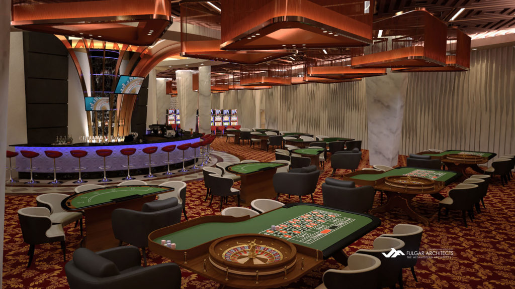 Casino area with bar showing gaming tables and electronic gaming machines.