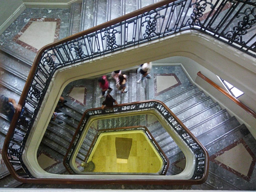 The art deco spiral staircase with adequate daylight is a fantastic illustration of how architecture can be used to enhance the visitor experience.