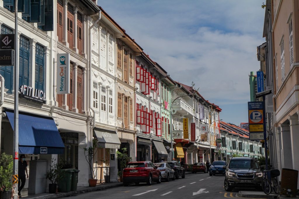 The shaded walkways and unique cultural design and layout of Singaporean shophouses.