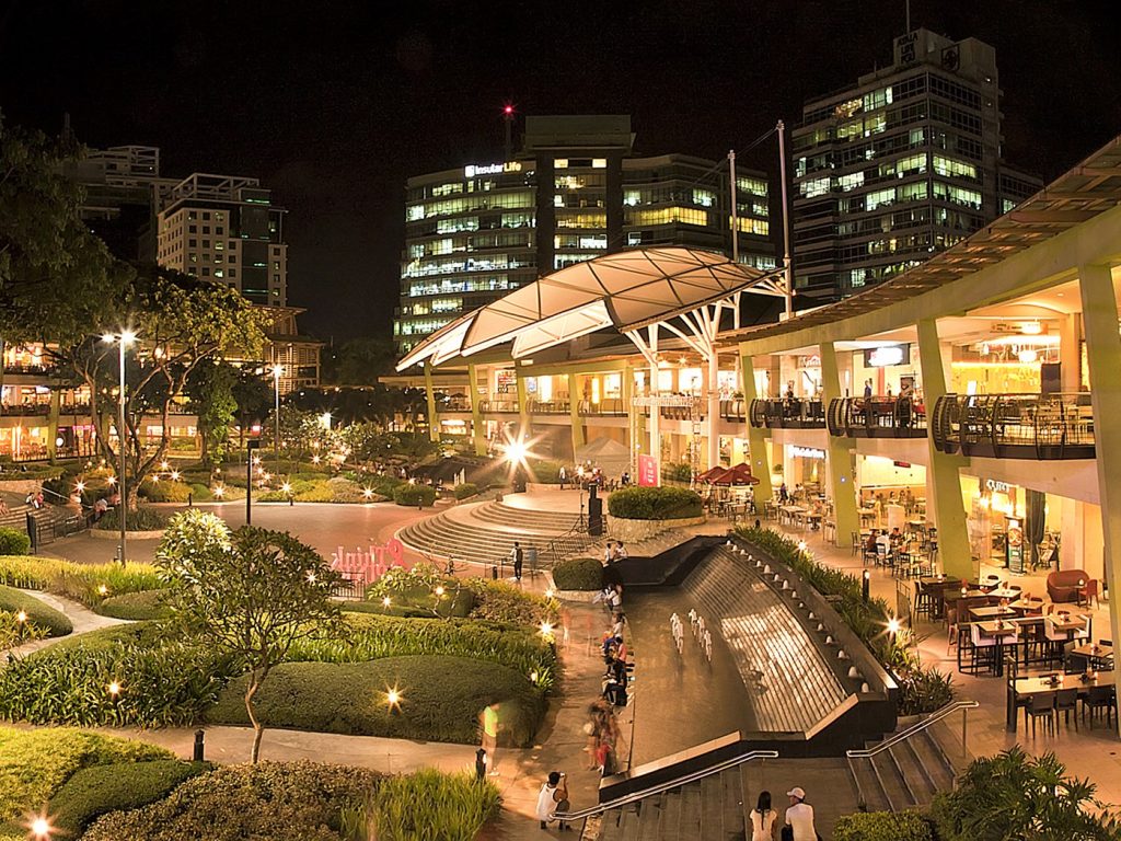The vibrant Ayala Center Cebu, a bustling commercial hub, glows with life and activity after sundown.
