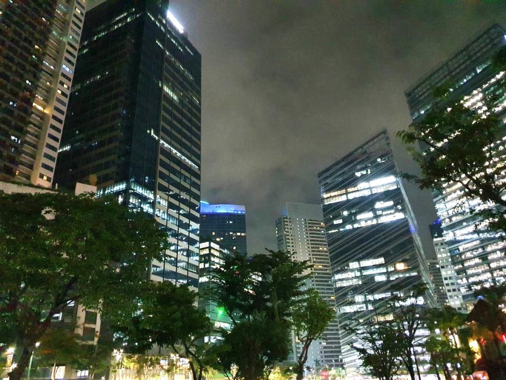Modern buildings in the central business districts of the Philippines, showcasing the blend of rapid urbanization and enduring principles of sustainable architecture.