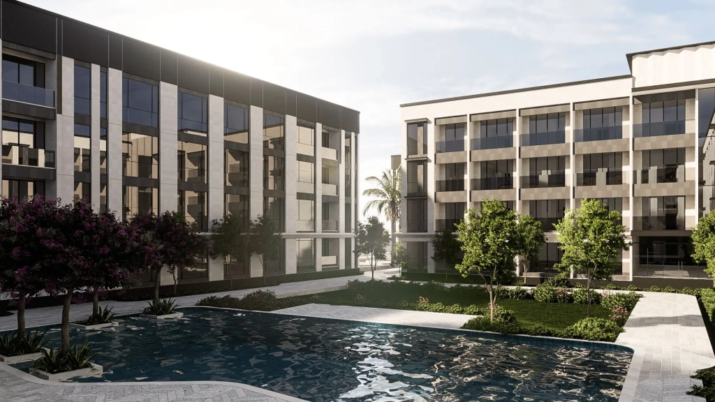 Lanson Integrated Estate with landscaped gardens, reflective water feature, mid-rise residential buildings, and layered tropical plantings.