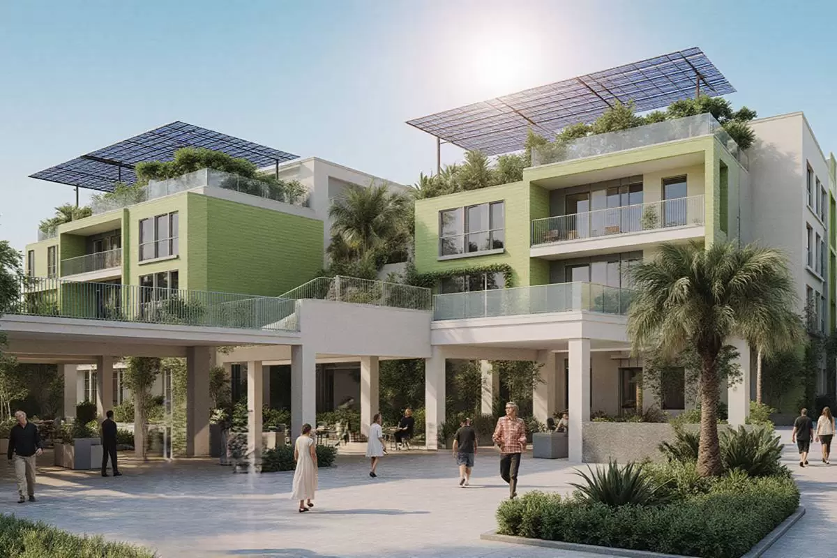 Green condominium redevelopment design with solar panels and landscaped terraces.