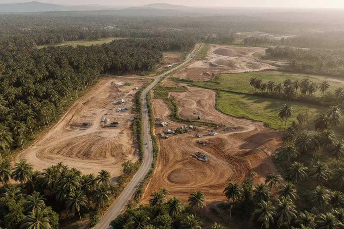 Aerial view showing early phases of master planning in the Philippines with plotted roads and green corridors.